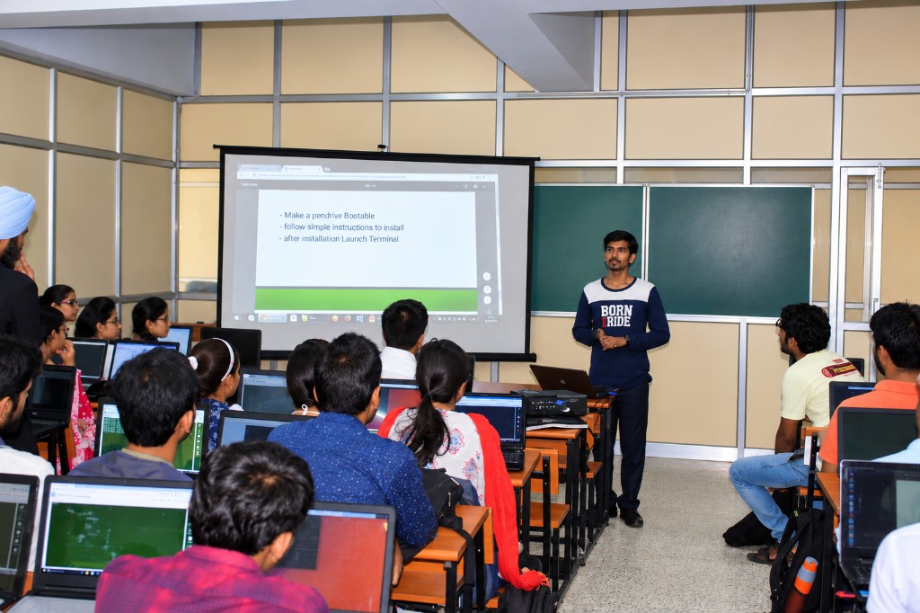 Parmanand Kumar teaching Linux in a classroom